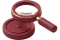 Magnifying glass over a coin showing transparent pricing